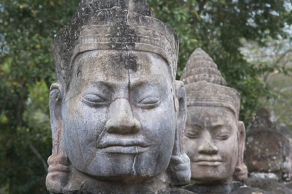 Buddhist statues at the South Gate of Angkor Thom, UNESCO World Heritage site