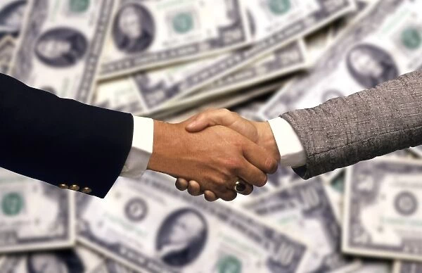 Two businessmen, in front of US currency, shaking hands to close a deal