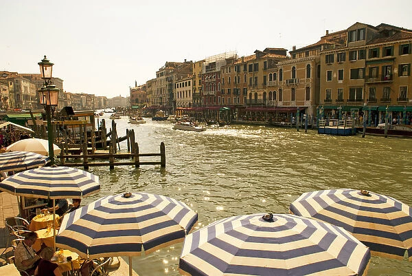 The bustling river front along the Gran Canal