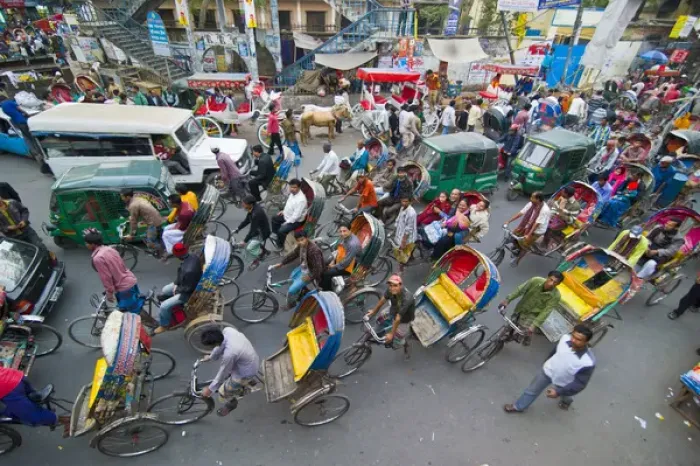 Framed Print : Very busy Rickshaw traffic on a street crossing in Dhaka, Bangladesh, Asia Framed Print : Very busy Rickshaw traffic on a street crossing in Dhaka, Bangladesh, Asia