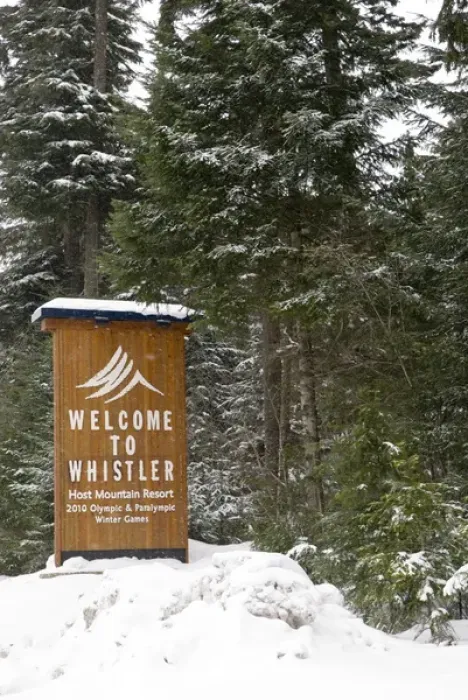 Framed Print : CA, BC, Whistler. Fresh snow piled atop entrance sign to Whistler announcing 2010