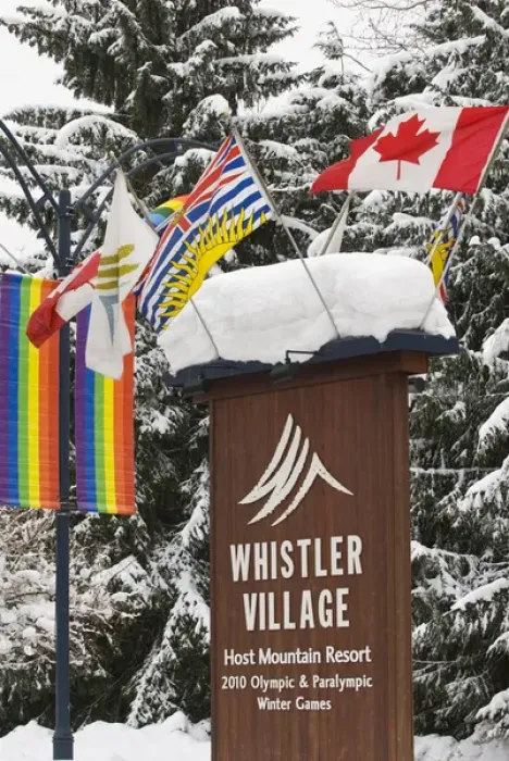 Framed Print : CA, BC, Whistler. Fresh snow piled atop entrance sign to Whistler Village announcing Framed Print : CA, BC, Whistler. Fresh snow piled atop entrance sign to Whistler Village announcing