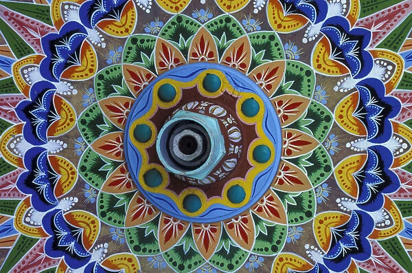 CA, Costa Rica Painted oxcart wheel