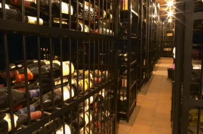 Framed Print : Cages with private wine collections at storage company Grappe where private individuals can store