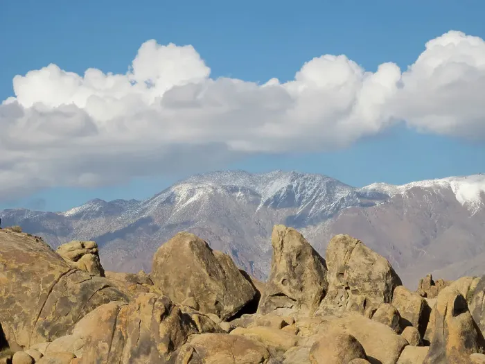 Framed Print : California, Alabama Hills. Weathered granite rock formations with the Inyo Mountains and clouds