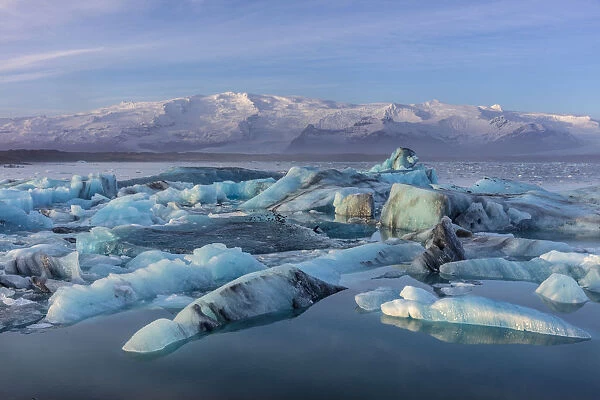 Calving icebergs in Jokulsarlon Glacier Lagoon in south Icleand