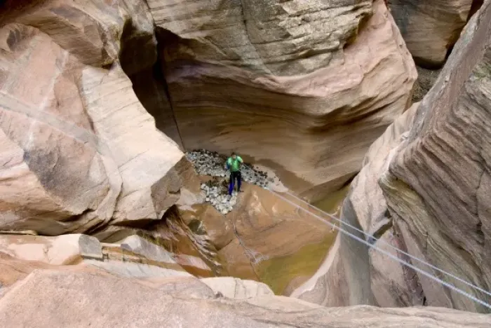 Framed Print : Cameron Carpenter straightening the rappel rope in Pine Creek Canyon, Zion National Park, Utah Framed Print : Cameron Carpenter straightening the rappel rope in Pine Creek Canyon, Zion National Park, Utah