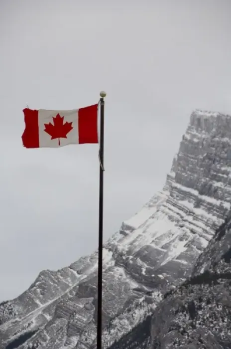 Framed Print : Canada, Alberta, Banff. Mountain view with flag