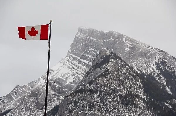 Canada, Alberta, Banff. Mountain view with flag