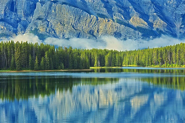 Canada, Alberta, Banff National Park. Reflection of Mt. Rundle in Two Jack Lake