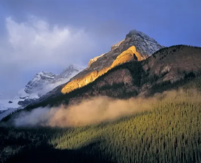 Framed Print : Canada, Alberta, Banff NP. Sunrise strikes the flank of the Canadian Rockies as clouds Framed Print : Canada, Alberta, Banff NP. Sunrise strikes the flank of the Canadian Rockies as clouds