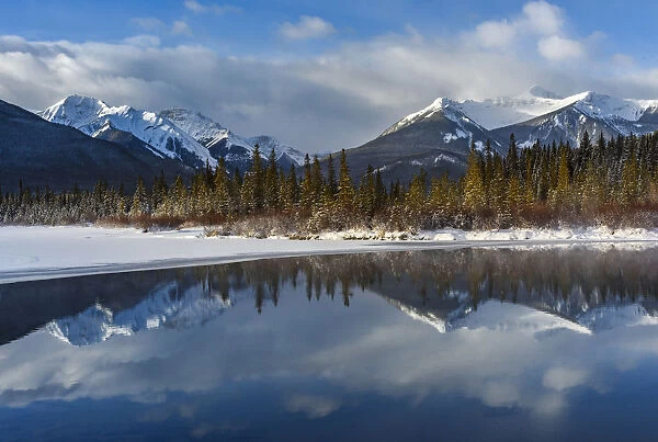 Canada, Alberta, Banff. Vermillion Lakes with mountain reflection in winter