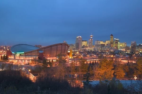 Canada, Alberta, Calgary: City Skyline from Ramsay Area  /  Evening with Saddledome