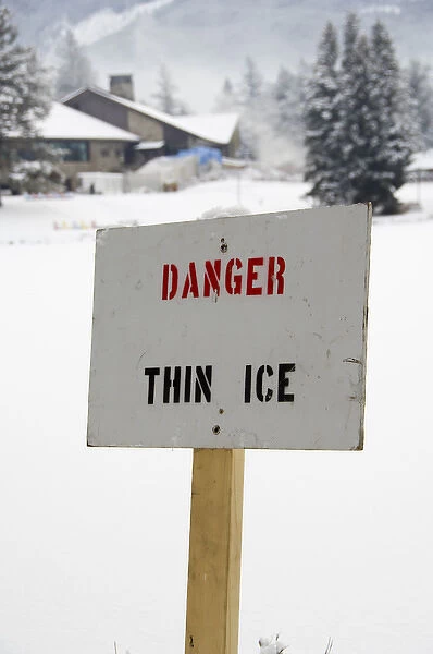 Canada, Alberta, Jasper, Jasper NP. Fairmont Jasper Park Lodge. Danger sign on frozen