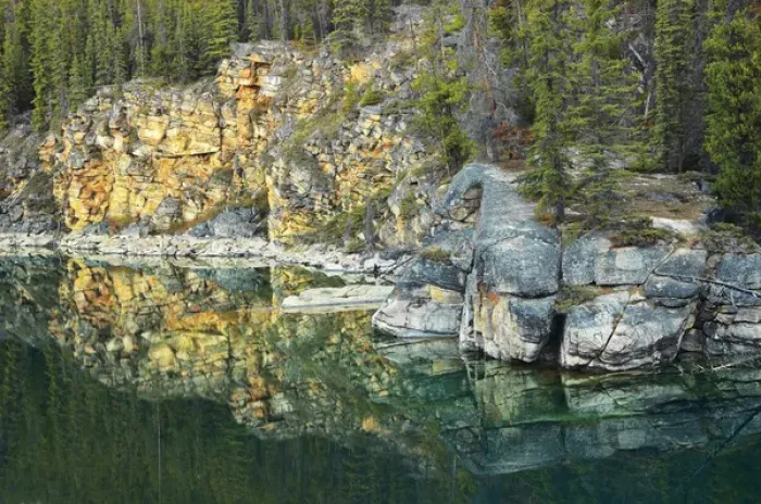 Framed Print : Canada, Alberta, Jasper National Park. Shoreline rocks reflected into Horseshoe Lake