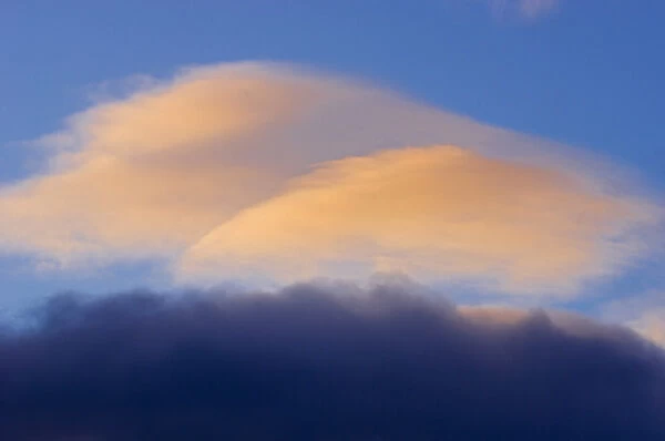 Canada, Alberta, Jasper National Park. Lenticular cloud at sunset