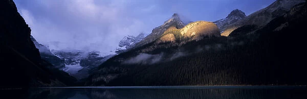 Canada, Alberta, Lake Louise. Dawn on Lake Lake in Banff NP, a World Heritage Site