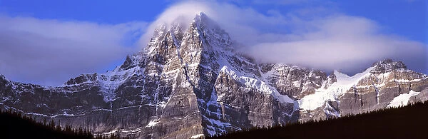 Canada, Alberta, Mt. Chephren. Mount Chephren wears a mantle of clouds in Banff NP