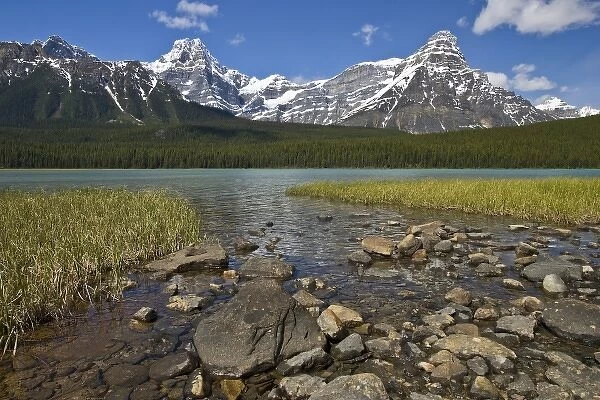Canada, Alberta, Rocky Mountains, Banff National Park, lake fed by snowmelt in creek