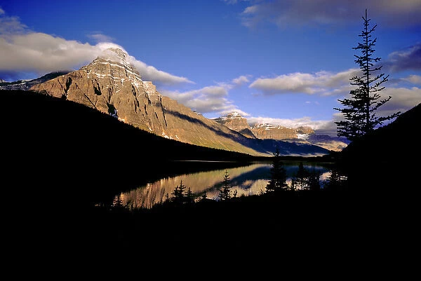 Canada, Alberta, Waterfowl Lakes. Waterfowl Lakes reflect the setting sun in Banff NP