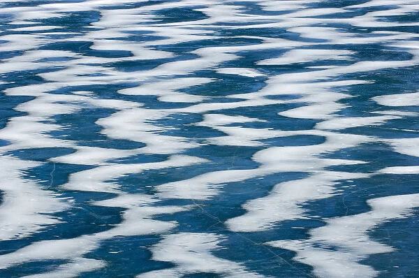 Canada, Alberta, Waterton Lakes National Park. Wind-blown pattern of ice and snow on Knight Lake