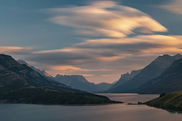 Canada, Alberta, Waterton Lakes National Park. Sunset over Waterton Lake