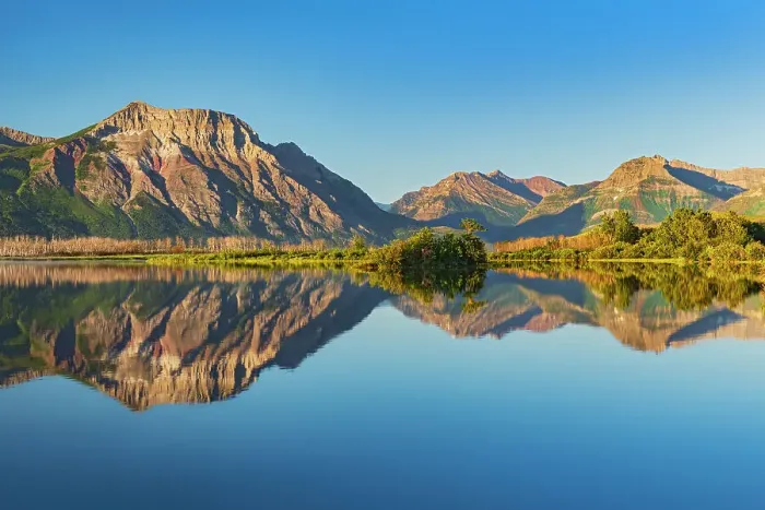 Framed Print : Canada, Alberta, Waterton Lakes National Park. Canadian Rocky Mountains reflected in Lower Waterton Lake Framed Print : Canada, Alberta, Waterton Lakes National Park. Canadian Rocky Mountains reflected in Lower Waterton Lake