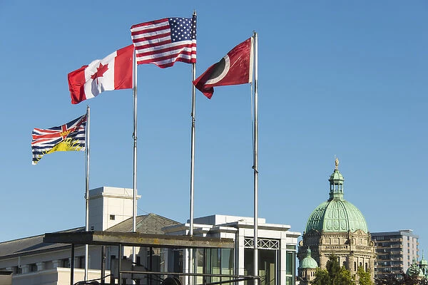 Canada, BC, Victoria. Inner Harbour. Flags flying ferry terminal