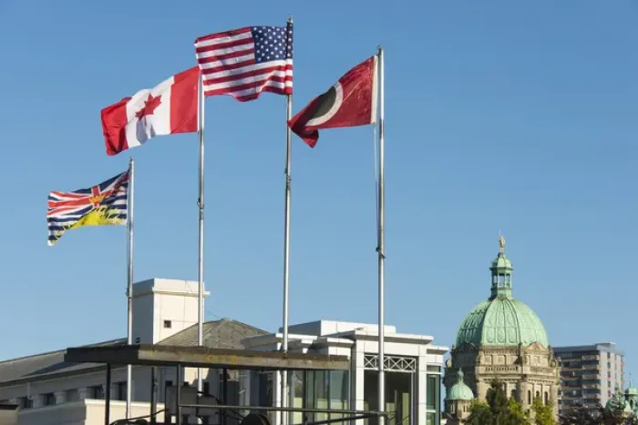 Framed Print : Canada, BC, Victoria. Inner Harbour. Flags flying ferry terminal