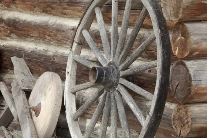 Framed Print : Canada, British Columbia, Fort Steele. Close-up of old wagon wheel, grinding stone, and log cabin Framed Print : Canada, British Columbia, Fort Steele. Close-up of old wagon wheel, grinding stone, and log cabin