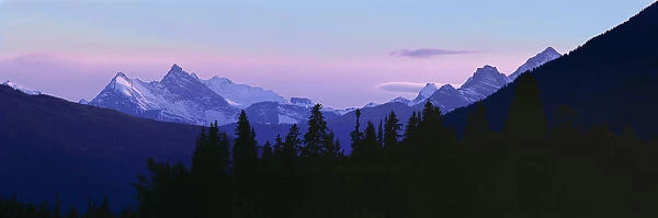 Canada, British Columbia, Mt Terry Fox. Mount Terry Fox turns periwinkle in the settling dusk