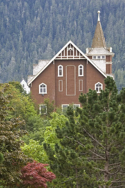 Canada, British Columbia, Prince Rupert. Church rises above trees. Credit as: Don