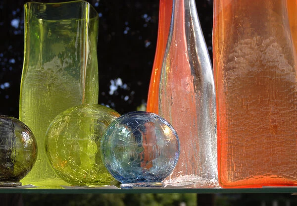 Canada, British Columbia, Salt Spring Island, Ganges. Blown glass balls and bottles