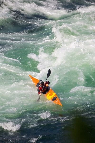 Canada, British Columbia. Sea kayaker at Skookumchuck Rapids. (MR)