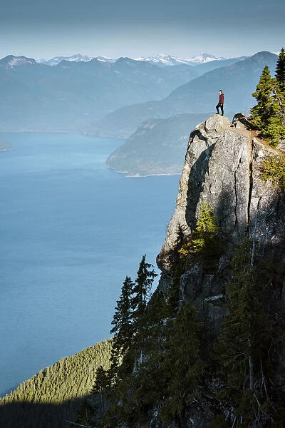 Canada, British Columbia, Vancouver. Hiker takes in the view St. Marks Summit. (MR)