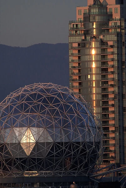 Canada, British Columbia, Vancouver Science World Dome and building are lit by