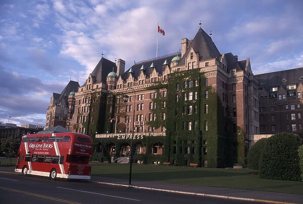 Canada, British Columbia, Victoria Double-decker bus passes in front of the Empress Hotel