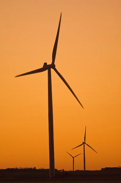 Canada, Manitoba, Somerset. Wind turbines at sunset