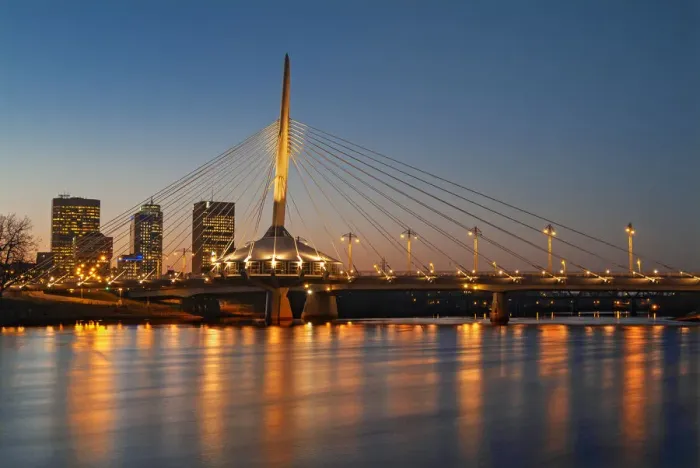 Framed Print : Canada, Manitoba, Winnipeg. Esplanade Bridge over Red River at sunset