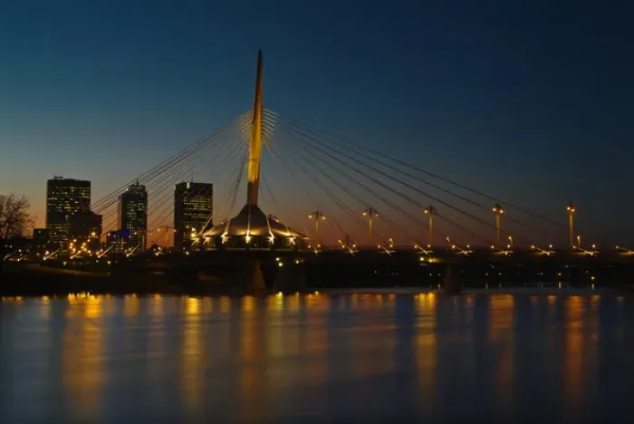 Framed Print : Canada, Manitoba, Winnipeg. Esplanade Riel bridge and city skyline reflected in Red River at dusk Framed Print : Canada, Manitoba, Winnipeg. Esplanade Riel bridge and city skyline reflected in Red River at dusk