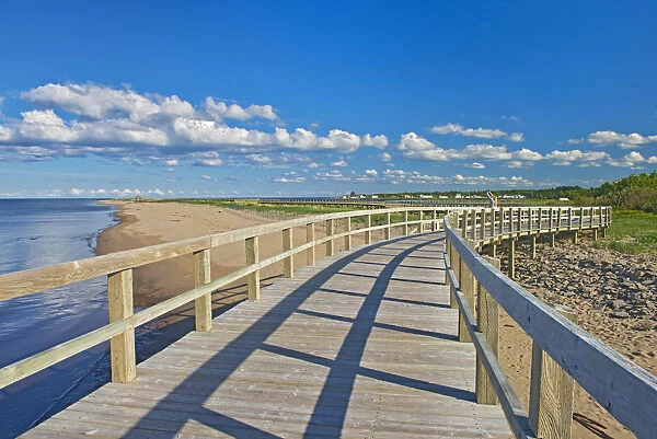 Canada, New Brunswick, Bouctouche. Boardwalk next to ocean