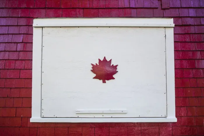 Framed Print : Canada, New Brunswick, Campobello Island, Welshpool, house with Canadian Maple Leaf Framed Print : Canada, New Brunswick, Campobello Island, Welshpool, house with Canadian Maple Leaf