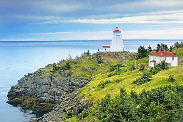Canada, New Brunswick. Swallowtail Lighthouse on Bay of Fundy