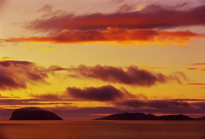 Framed Print : Canada, Newfoundland, York Harbour. Fiery sky over Gulf of St. Lawrence at sunset