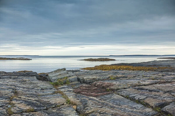 Canada, Nova Scotia, Blue Rocks. Coastal fishing village, rocky shoreline