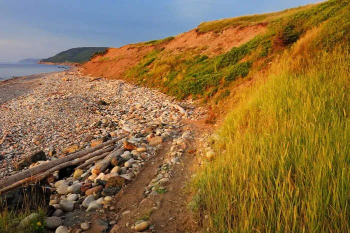 Framed Print : Canada, Nova Scotia, Pleasant Bay. Red cliffs at sunset on Cabot Trail. Credit as Framed Print : Canada, Nova Scotia, Pleasant Bay. Red cliffs at sunset on Cabot Trail. Credit as