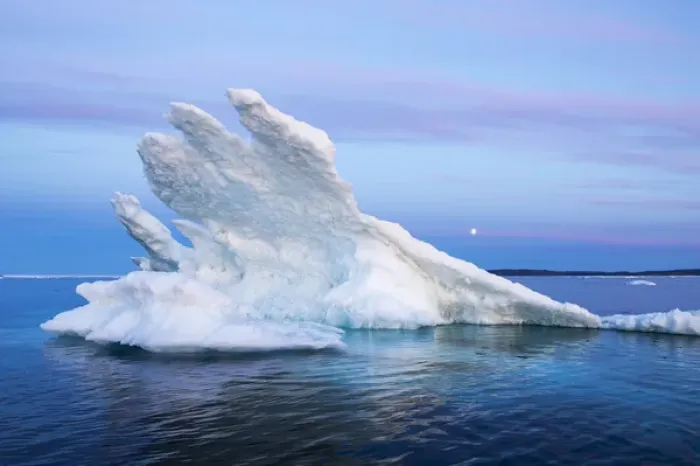 Framed Print : Canada, Nunavut Territory, Moon rises behind melting iceberg in Frozen Channel