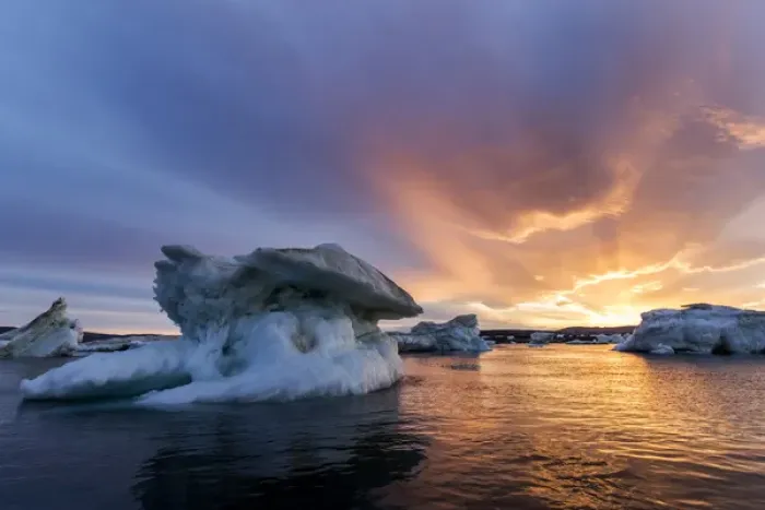 Framed Print : Canada, Nunavut, Territory, Setting midnight sun lights clouds above melting iceberg Framed Print : Canada, Nunavut, Territory, Setting midnight sun lights clouds above melting iceberg