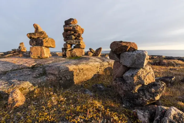 Framed Print : Canada, Nunavut, Territory, Setting sun lights stone cairns on Harbour Islands along Framed Print : Canada, Nunavut, Territory, Setting sun lights stone cairns on Harbour Islands along