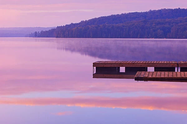 Canada, Ontario, Algonquin Provincial Park, Dock and fog on Lake of Two Rivers